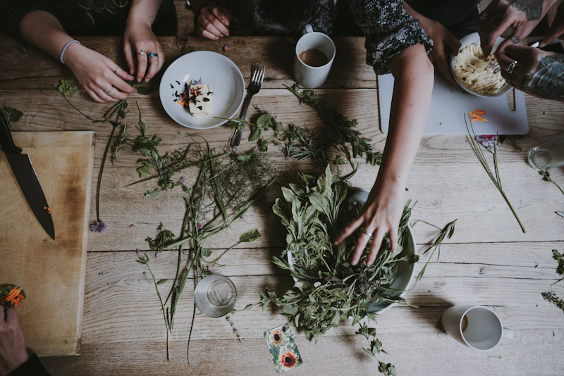 Fresh herbs being prepared for natural medicine